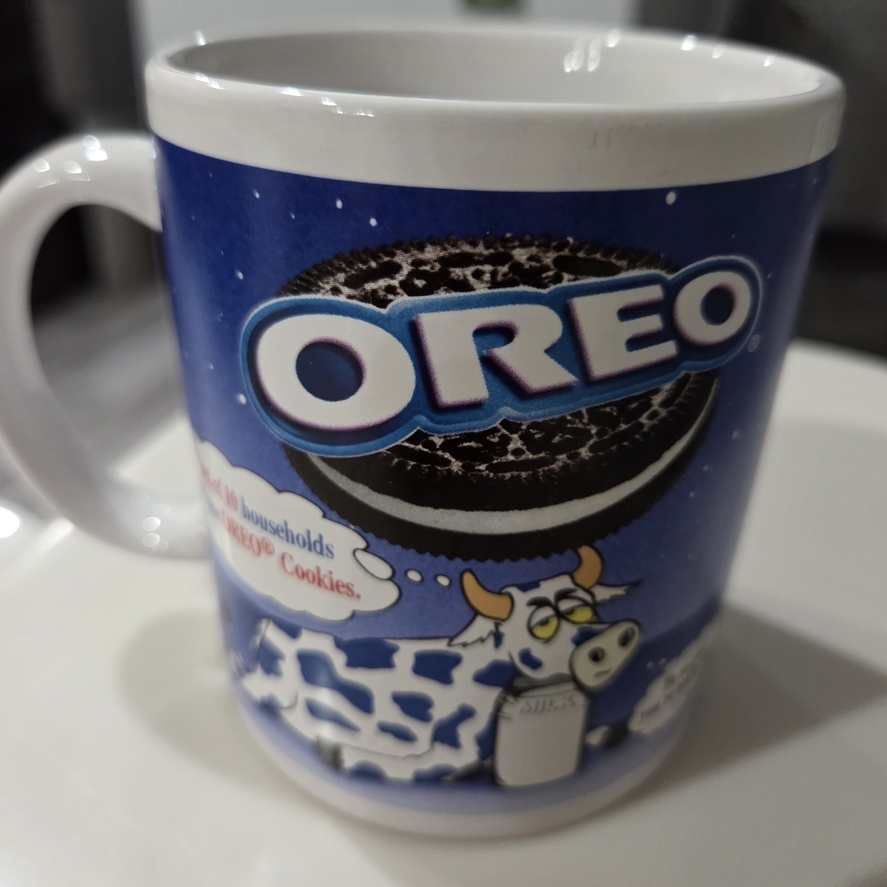 Vintage Oreo Blue and White Coffee Mug With Cow Motif